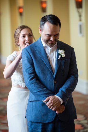 engaged couple's first look before their Clearwater Beach wedding