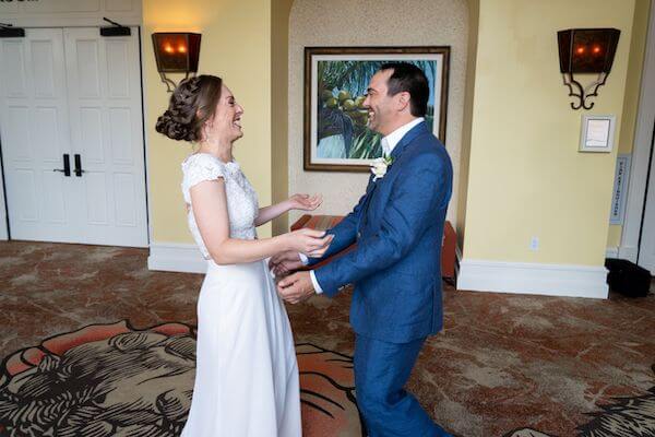 engaged couple's first look before their Clearwater Beach wedding