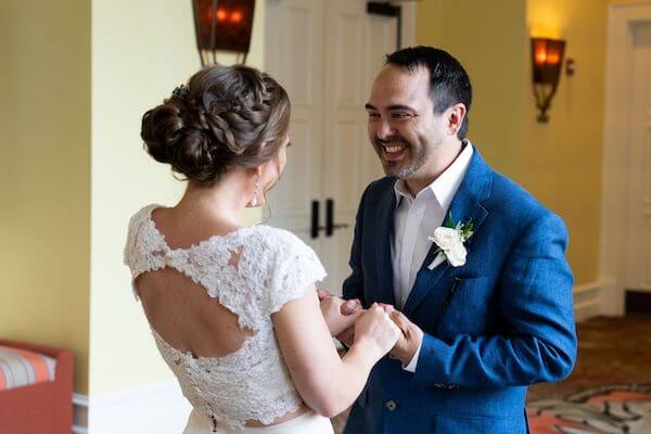 engaged couple's first look before their Clearwater Beach wedding