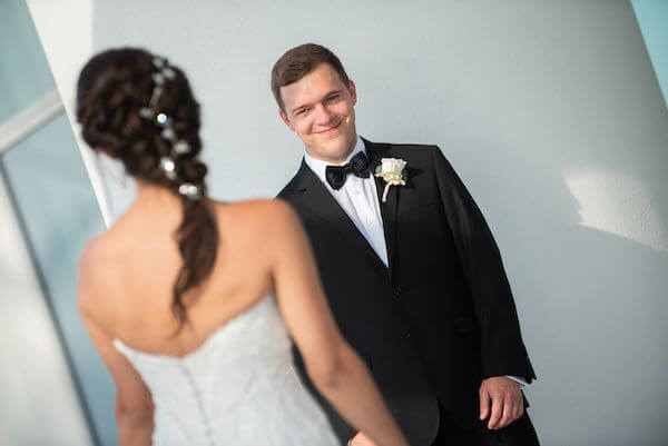 Clearwater Beach bride and groom having their first look at the Opal Sands Resort