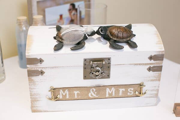 a box for wedding cards decorated with bride and groom sea turtles for a beach themed wedding