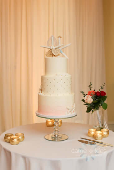 four tiered beach themed wedding cake