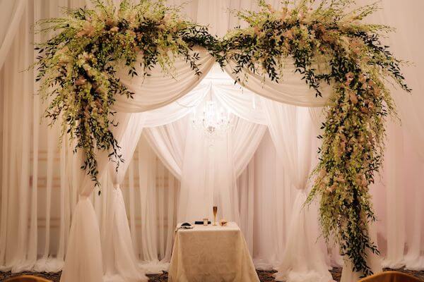 luxurious wedding chuppah with white orchids