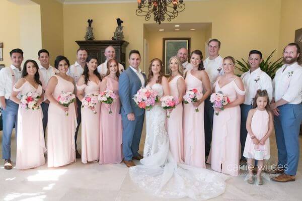 bride and groom with their wedding party at the Sandpearl Resort on Clearwater Beach