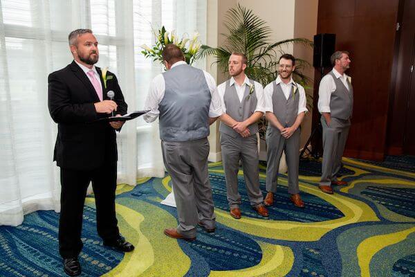 groom overtaken with emotion watching his bride walk down the aisle