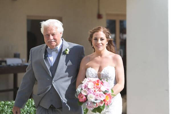 bride walking down the aisle at the Sandpearl Resort on Clearwater Beach