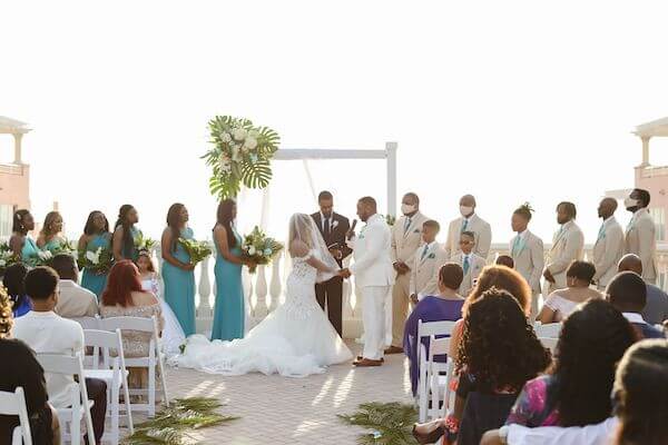 bride and groom exchanging wedding vows on the Sky Terrace at the Hyatt Regency Clearwater Beach 