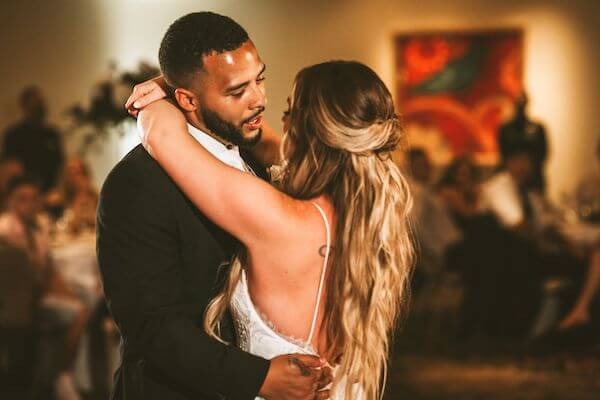 Bride and groom during their first dance at their Sandpearl Resort wedding reception