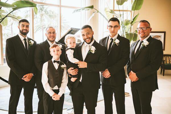 groom and his groomsmen at the Sandpearl resort