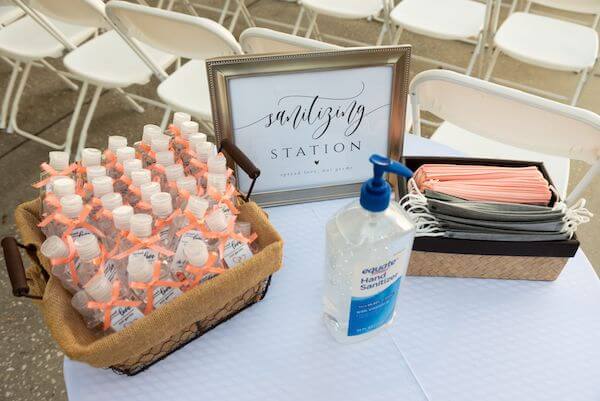 sanitizer and face masks at a St. Pete beach wedding