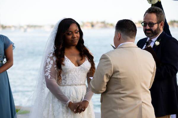 couple exchanging wedding vows at their St. Pete beach wedding