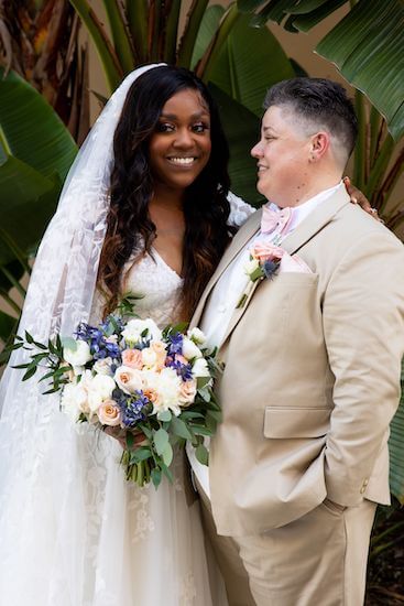 same sex couple at their St. Pete Beach wedding