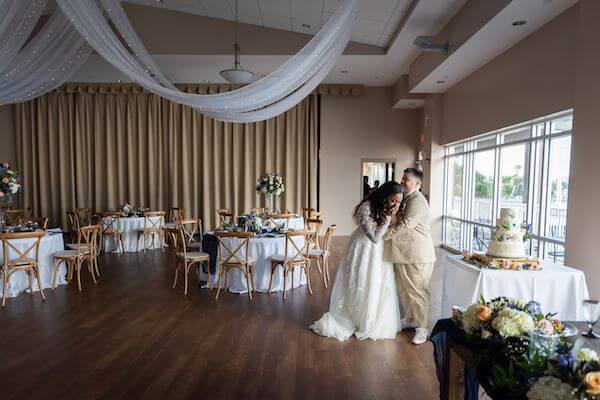 excited couple seeing their st. Pete Beach wedding reception for the first time