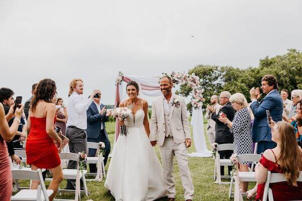 Just Married! Bride and groom exiting their wedding ceremony