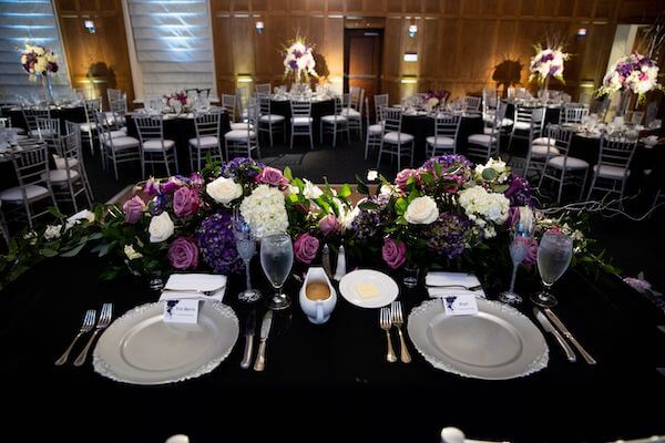 ballroom of the Le Meridien Tampa set in purple, black and silver for a halloween themed wedding