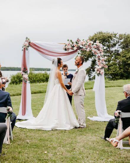 bride and groom exchanging wedding vows at Tampa Bay Watch