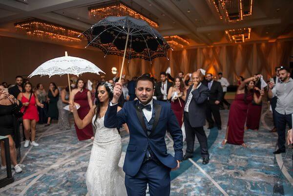 Tampa bride and groom during a second line at thier wedding reception