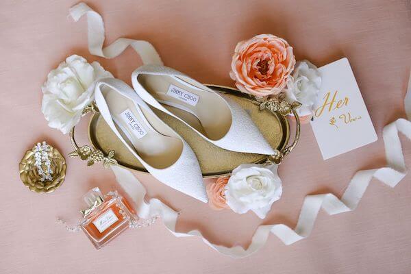 brides accessories with Jimmy Choo shoes and perfume