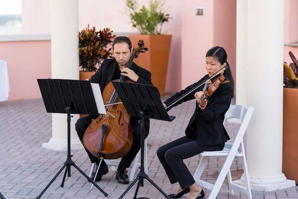 Sunset Strings playing at a Clearwater Beach wedding ceremony