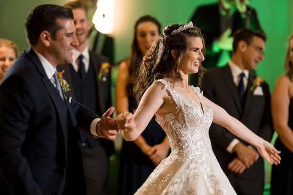 Bride and groom making thier grand entrance into the Aqualea Ballroom of the Hyatt Regency Clearwater