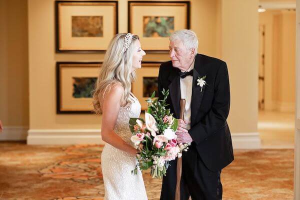 bride having a first look with her father at the Sandpearl Resort