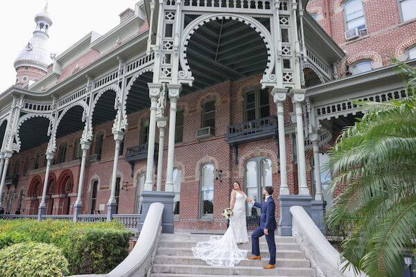 Tampa bride and groom on the steps of the University of Tampa