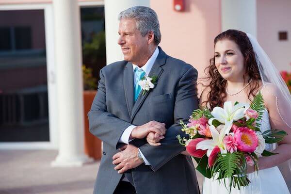 bride walking down the aisle on the Sky Terrace of the Hyatt Clearwater Beach