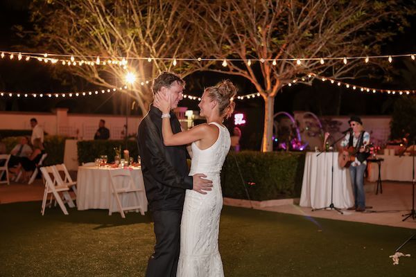 bride and groom's first dance at their garden wedding