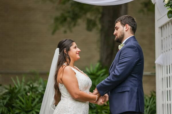 Tampa bride and groom exchanging wedding vows