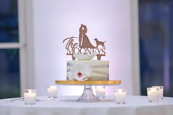 Intimate wedding cake with a custom cake topper