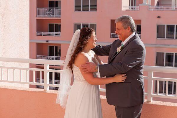 Bride's firstlook with her father on the rooftop of the Hyatt Clearwater Beach