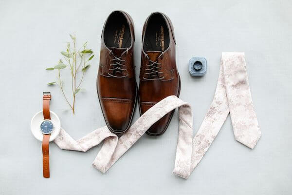 flatlay photo of a Tampa groom's personal items