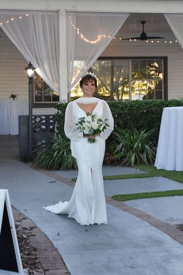 bride walking down the aisle at the Davis Islands garden club