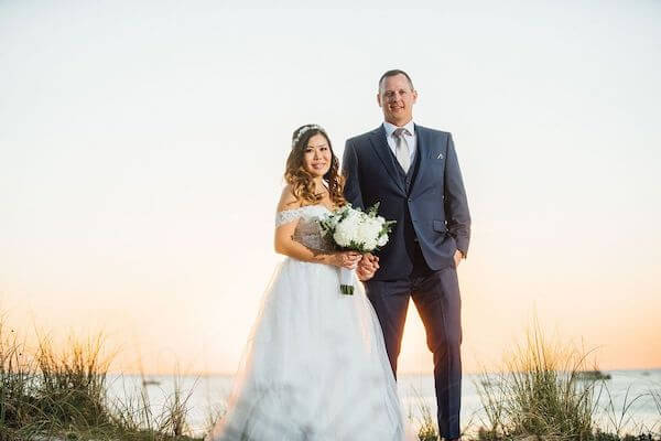 bride and grommet sunset on Clearwater Beach