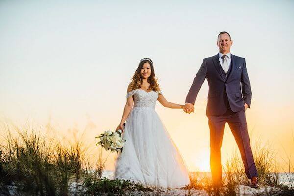 Bride and groom at sunset on Clearwater Beach