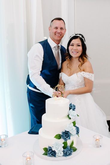 Hyatt Regency Clearwater Beach couple cutting their wedding cake by Chantilly Cakes