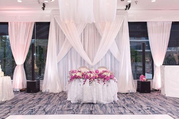 Sweetheart table at a Rusty Pelican Tampa wedding reception 