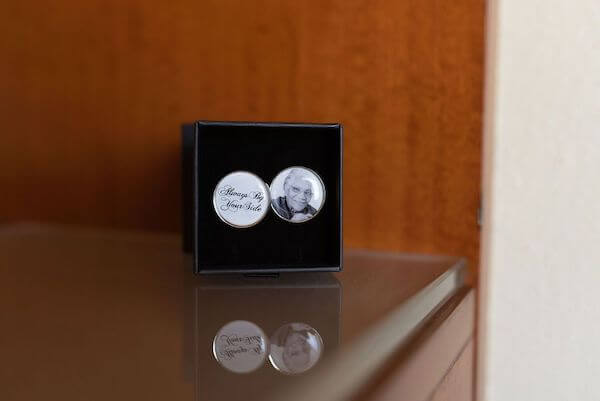 Personalized cufflinks with the groom's late mother's pictures