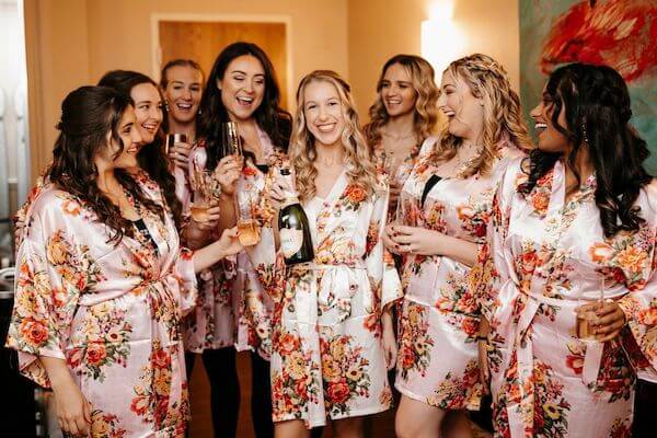 St Pete bride toasting with her bridesmaids