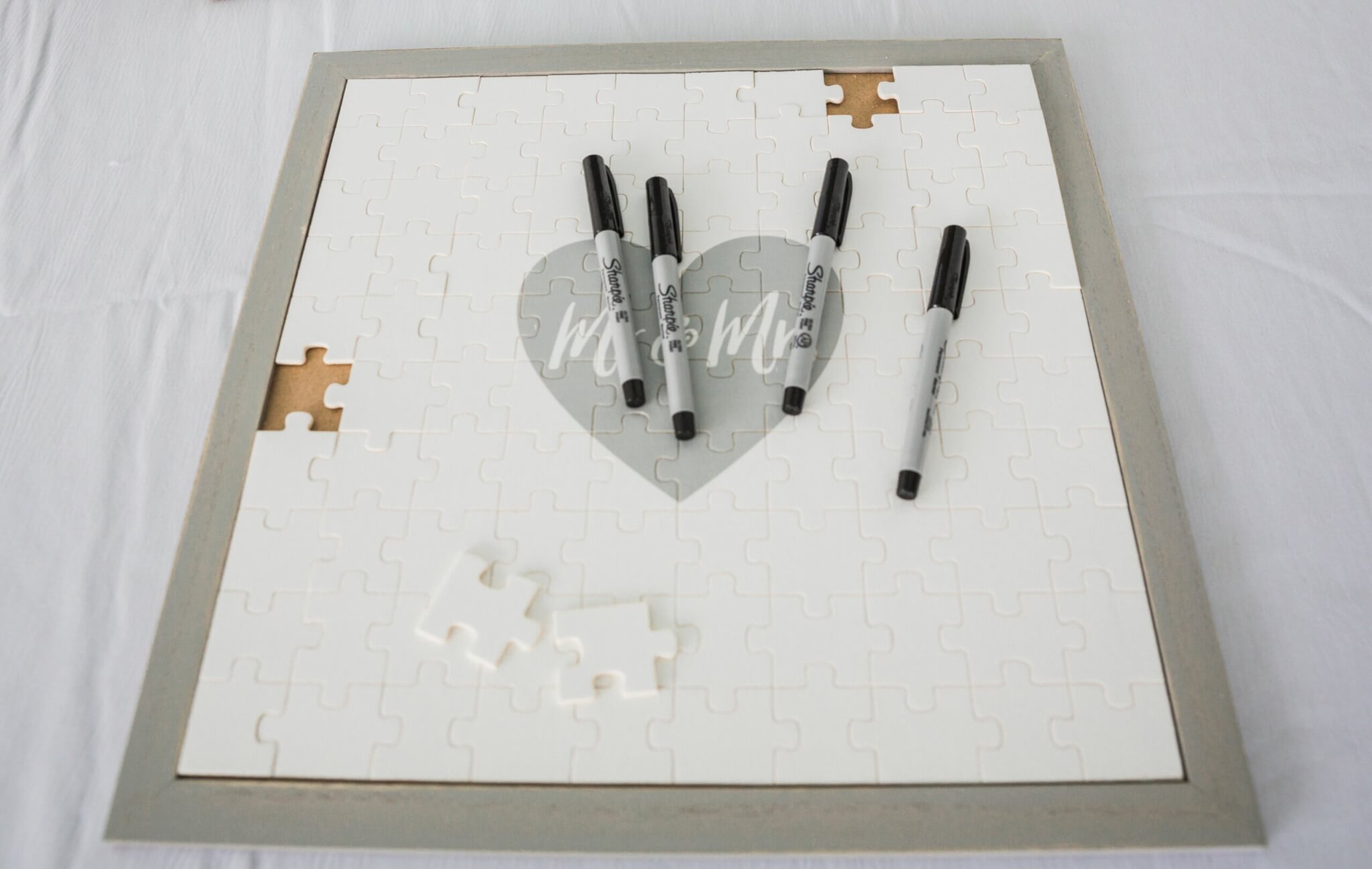 custom wedding guest book of puzzle pieces