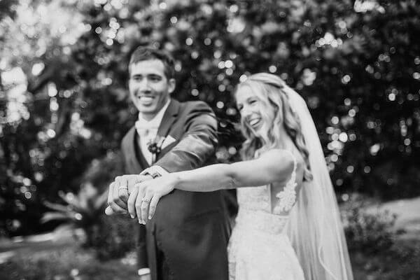 St Pete newlyweds showing off their new wedding rings