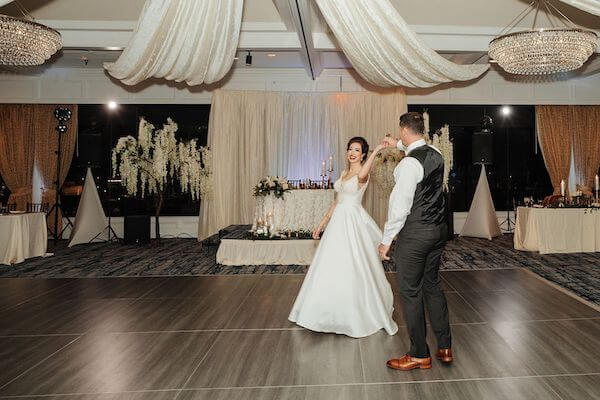 bride and groom practicing thier first dance