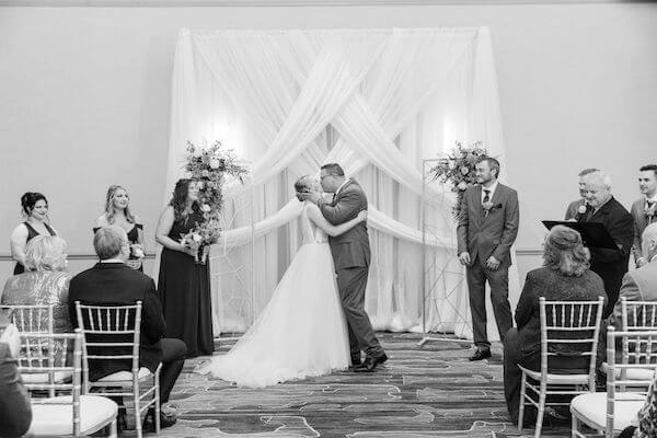 Tampa newlyweds sealing thier vows with a kiss