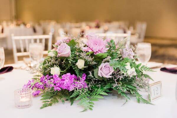 Purple floral centerpieces for a Tampa wedding