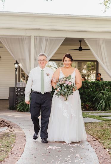 Father of the bride walking his daughter down the aisle at Davis Islands Garden Club