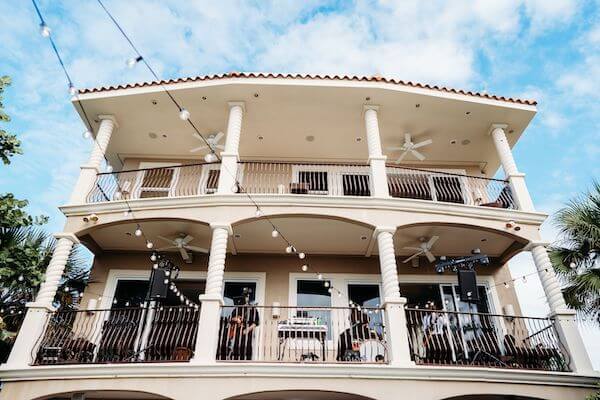 Matt Winter Band set up on the beach houses balcony