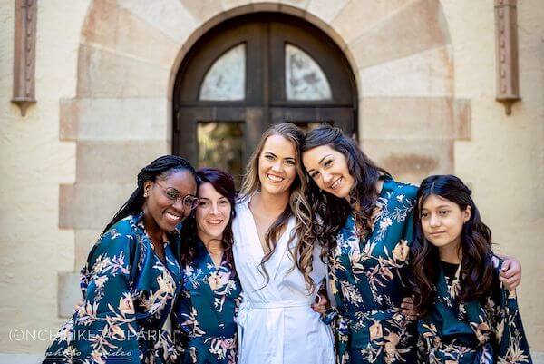 bride and bridal party in robes