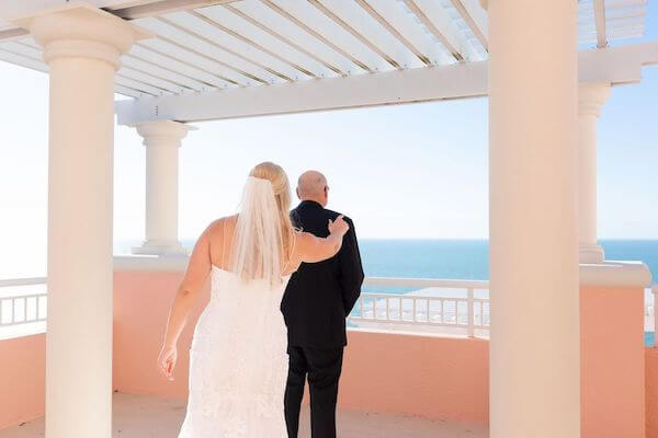 Clearwater Beach bride walking up behind her dad