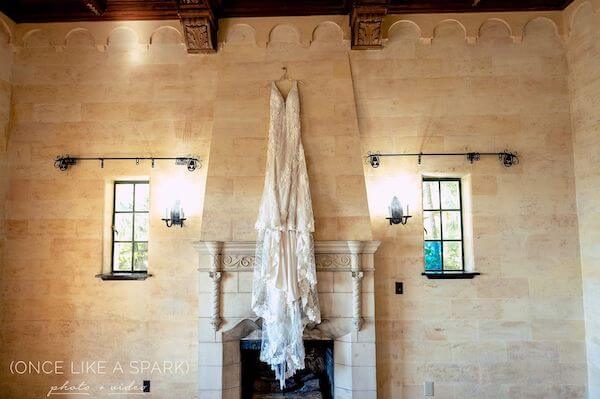 wedding gown hanging over the fireplace at Powel Crosley Estate