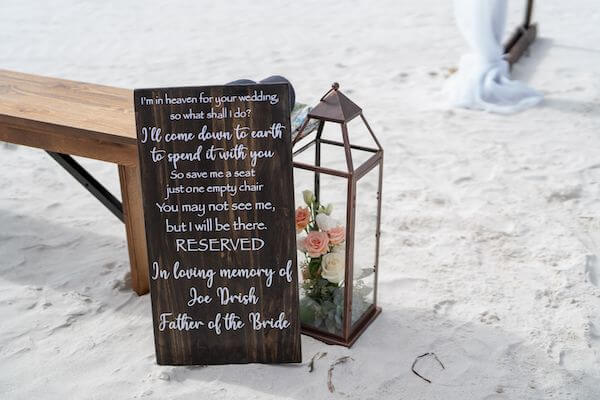 Seat reserved in the front row in memory of the brides' father